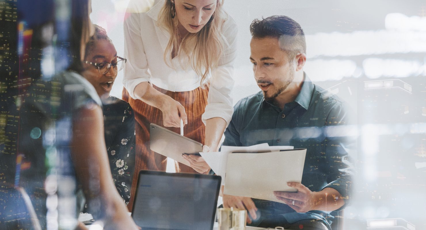 Business people working with a digital tablet in a meeting